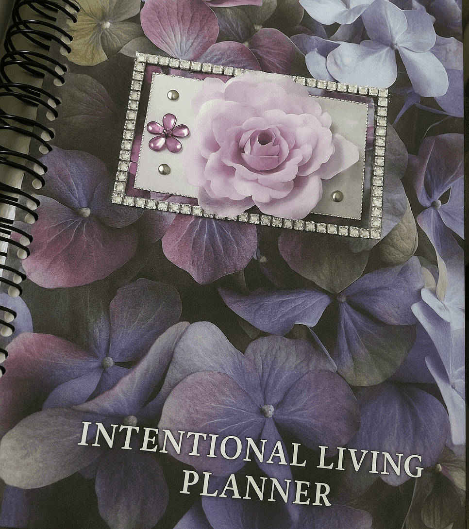 Planner cover with purple flowers and diamond-trimmed rose design.